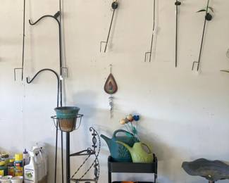 More yard art, plant stands, gardening stuff