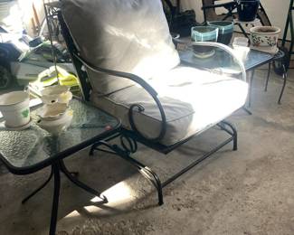 Patio chair with cushion and side tables, flower pots