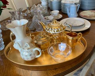 Various serving pieces, gold tray
