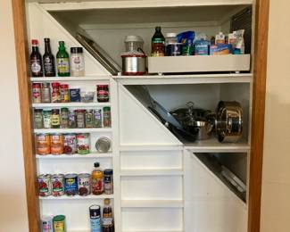 Spices and canned goods, pots and pans and skillets