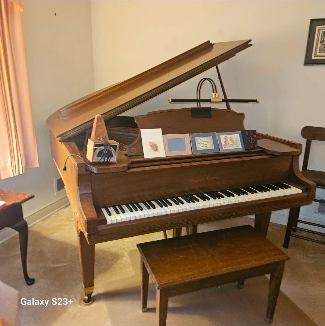 Living room, She taught children Piano lessons.