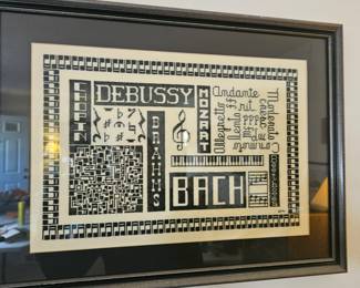 Main room near Piano on wall