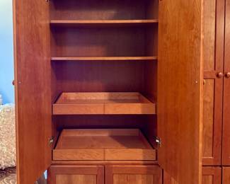 Inside of one side of armoire