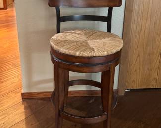 One of three kitchen counter stools