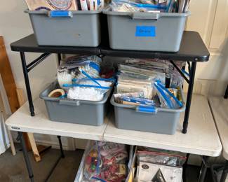 Rulers, doll supplies, sewing notions.  