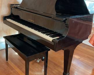 Beautiful K Kawai black baby grand piano with bench.  