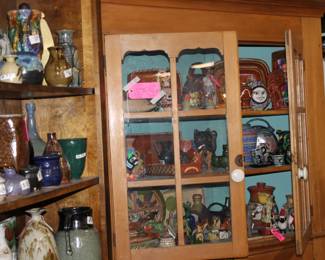 beautiful pottery and a really nice piece of furniture