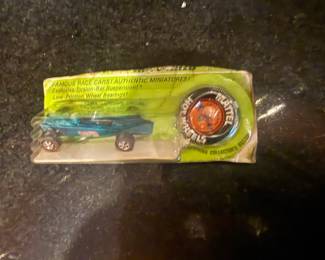 Redline Hotwheel Lotus in cut blister. Car is in new condition. This item will be at checkout, 