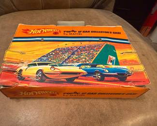 Redline Hotwheel collection of 12 #2. This set is in a rare pop up collectors case. Will be sold as a set.