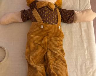 Several Raggedy Ann dolls