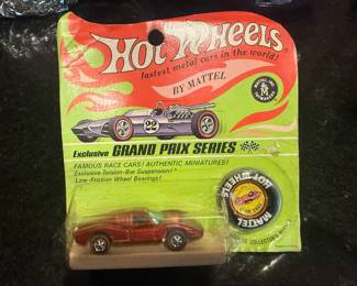 Redline Hotwheel metallic red Ford Mk IV in blister pack. 