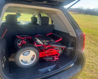 BID SHEET ITEM Electra 7 HD Lighweight Large Capacity Electric Folding Wheelchair. See Paul Holder Realty & Auction Facebook Page for bidding 