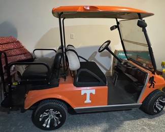 BID ITEM: Gas powered UT Fan golf cart. Follow Paul Holder Realty & Auction page for more pics and bidding.