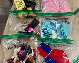 Ton of vintage Barbie outfits and dolls from the 1960’ thru the 1980’s