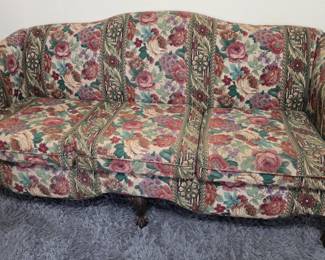 Floral sofa (matches loveseat) with wood claw feet.