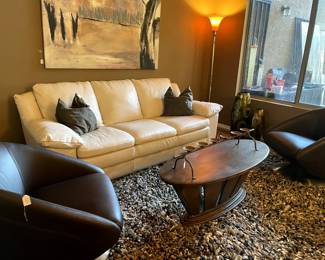 White Leather Italsofa, two dark brown chairs, crate and barrel shag rug (there are two in the sale!), wooden oval coffee table