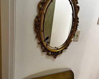 #21	Gold Plastic Wall Shelf w/Mirror - 23x9x8 - Mirror Oval - 17x29	 $20.00 
