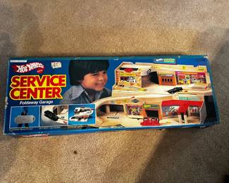 #65	Hot Wheels Stow and go Service center in original box - 1970s	 $45.00 
