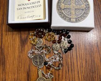 Lots of nice Catholic Rosaries in a variety of different beads, stones, and medallions. 