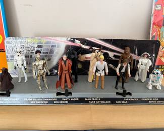 Whoa!! Did we mention we had this too? Another Star Wars “Holy Grail”. This is the vintage 1978 Kenner Star Wars Mail-Away Display Stand featuring the first 12 original action figures.  This sale is just too good to be true!!!
