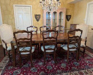 Dining Table with two leaves goes from 7 to 12 feet with 2 arms chairs and 4 dining chairs