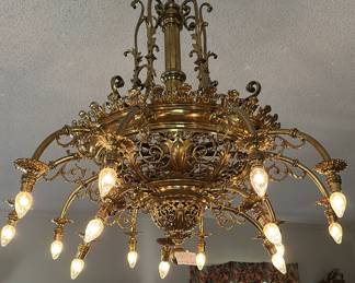 Antique electric brass chandelier, thought to be European. 