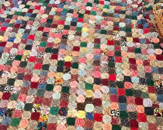 Vintage handmade yo-yo quilt