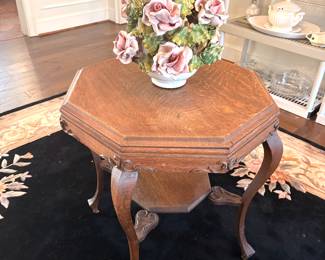 Octagonal parlor table with Capodemonte arrangement 