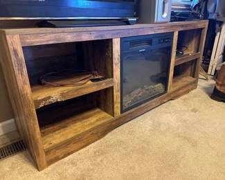 ENTERTAINMENT CENTER WITH BUILT IN FIREPLACE