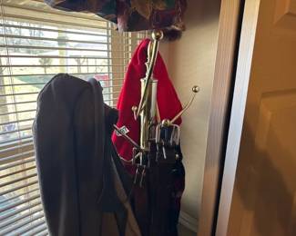 COAT RACK WITH COATS AND BELTS