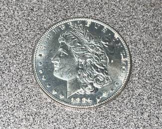 Eight  really nice Morgan Silver dollars