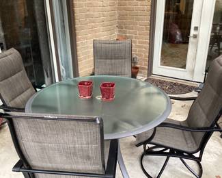 Table and four swivel chairs