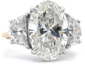 6.97 Carat Diamond Ring feat. Oval Cut and Half-Moon Cuts in 14k TT Gold