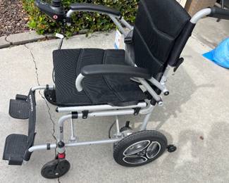 New w/Tags Journey Air Power Chair weighs just 35 lbs. 
