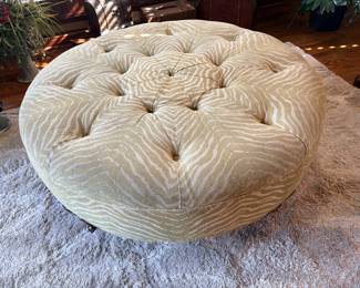 Tufted round animal print ottoman