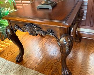Cocktail side table featuring acanthus leaf accents and claw feet