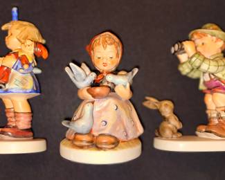 Hummel figurine collectible figurines, including Cinderella looking at birds