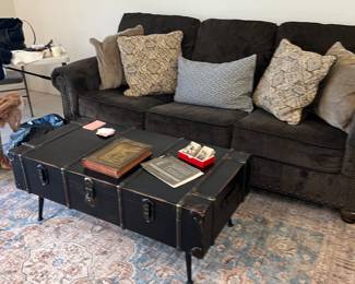 CONTEMPORARY SOFA, COFFEE TABLE (OPENS FOR STORAGE), VINTAGE BOOK, AREA RUG
