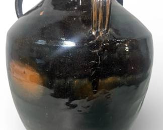 A Chinese Glazed Earthenware Wine Jar
