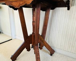 Detailed View of the Gorgeous Carved Wooden Side Table on Castors.