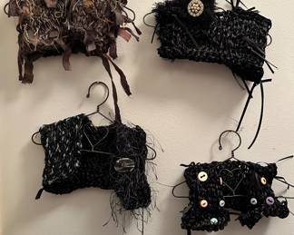 Whimsical Textile Art Pieces, Mini Vests on Iron Heart Mini Hangers, so Fun!