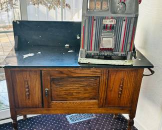 Antique Wash Stand with Black and White Marble Top and Side Towel Bars,  40"W x 17" x 37"H Shown with a Vintage Star Brand Slot Machine.