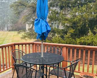 Classic Round Wrought Iron Table and Chairs with Treasure Garden 9' Hexagon Push Button Tilt Umbrella with Sunbrella Fabric.