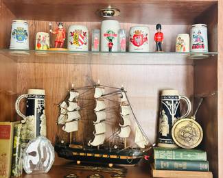 The Fantastic Collection of German Beer Steins Continues Alongside Vintage Books and Decor.