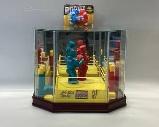  JOHNY HENDRICKS AND DONALD CERRONE AUTOGRAPHED ROCKâ€™EM SOCKâ€™EM GAME FROM UFC 167 NOV.16, 2013 FEATURING JOHNY BIGG RIGG HENDRICKS AND DONALD COWBOY CERRONE IN DISPLAY CASE. BONUS FINGER FIGHTER GAME.