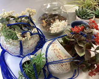 MACRAME FAUX PLANTS 3 TIER MACRAME, LAVENDER MACRAME, TWO MACRAME HANGERS UNUSED, LARGE GLASS TERRARIUM SEVEN POTS SOME WITH FAUX PLANTS
