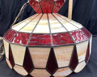 MCM SLAG GLASS HANGING LAMP 20x13.5 INCHES NOVA IMPORT CO. TIFFANY STYLE RUBY CARAMEL SLAG GLASS HANGING LAMP. NO CRACKS WITH 24Ft. CORD WITH CHAIN AND SWITCH. 20 INCHES IN DIAMETER AND 13.5 INCHES TALL. STANDARD BULB SOCKET. NO SHIPPING, PICKUP ONLY