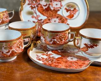 
This lot features a beautiful Japanese Kutani porcelain tea and snack set. The set features a vibrant, hand-painted design with a peacock and peonies motif. 

It is made of delicate "eggshell" porcelain. The entire set comes in excellent condition and includes six (6) cups and plates.
