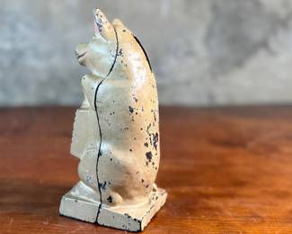 This lot features a J.M.R. Hubley No. 82 cast iron “Thrifty Wise Pig” piggy bank that measures, 6.5” H.

