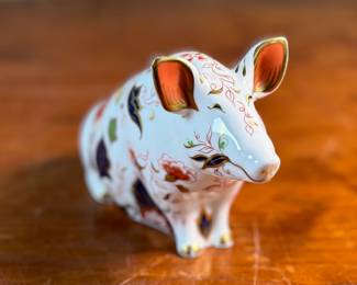 This lot features a Royal Crown Derby Imari-patterned "Sitting Pig" in excellent condition.

